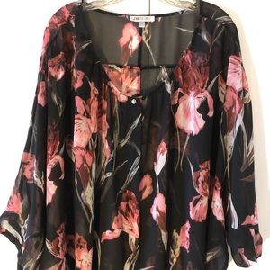 Jennifer Lopez sheer floral blouse